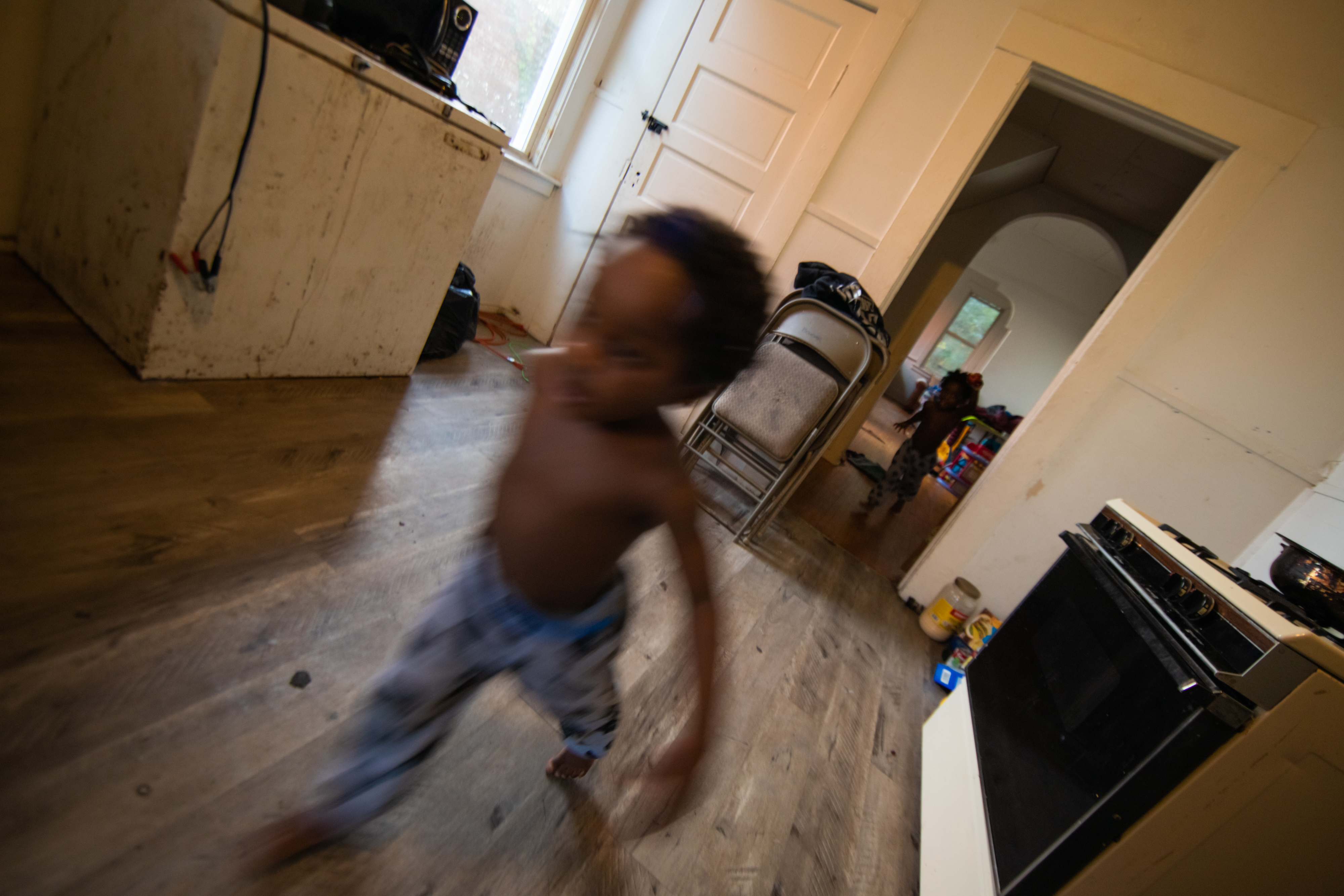 child running in house