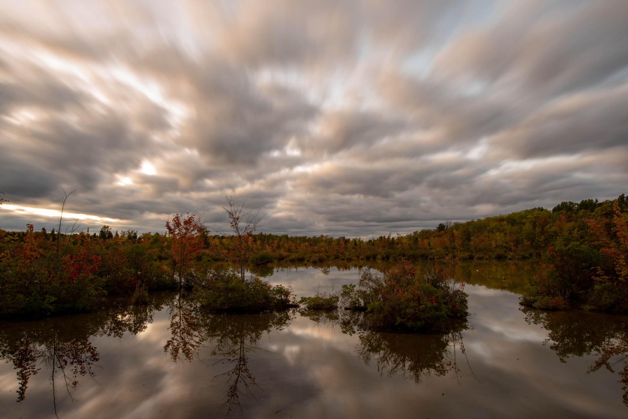 pond with clouds